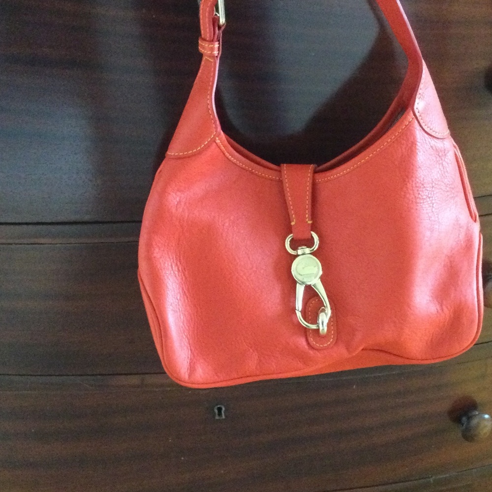 Vintage Dooney and Bourke orange pebble bag with latch GUC